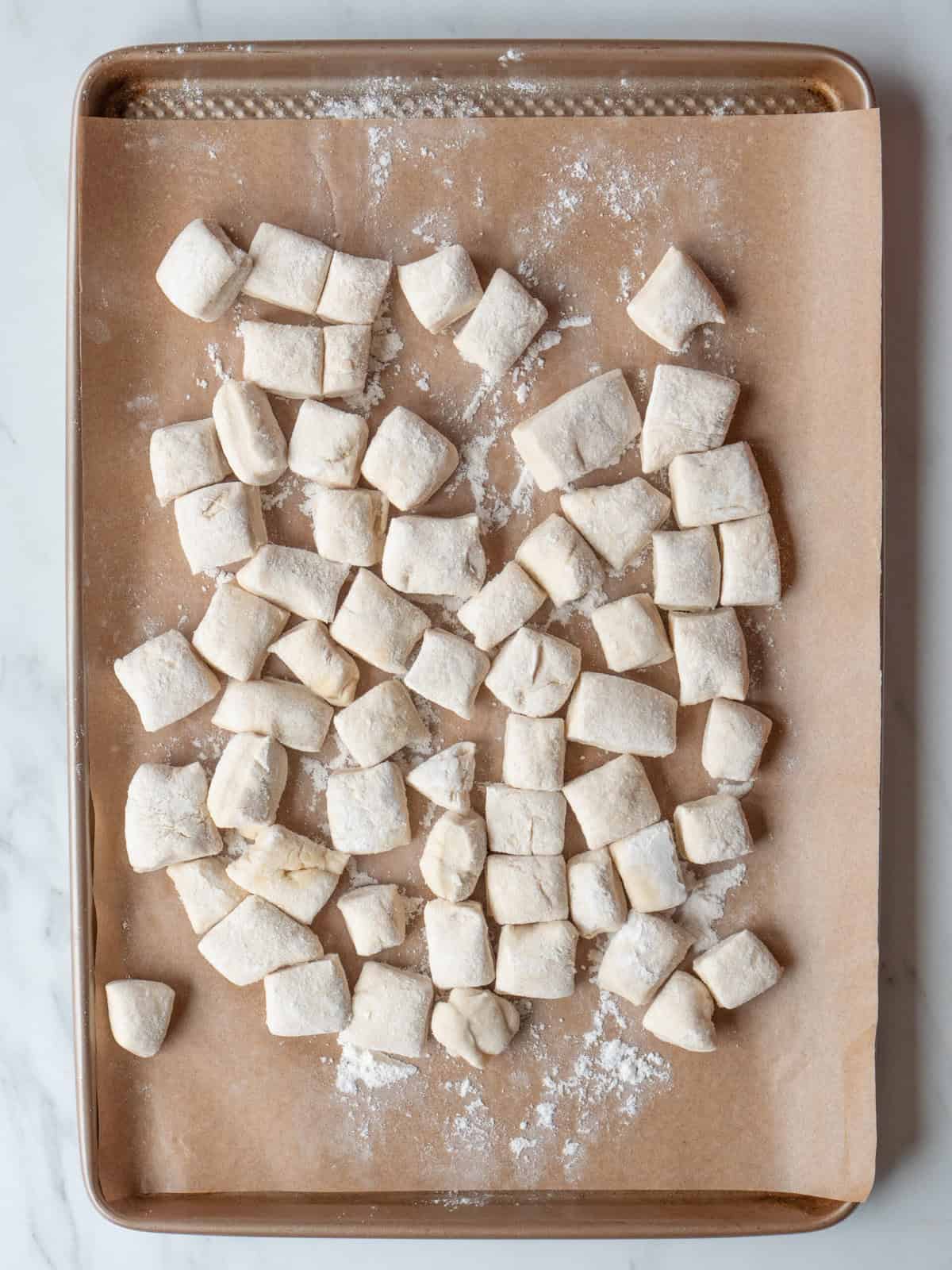 Cut pieces of dough on parchment