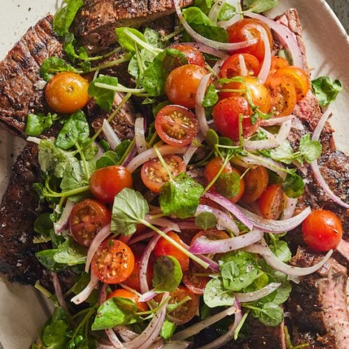 Grilled Skirt Steak with Tomato Salad from www.whatsgabycooking.com (@whatsgabycookin)