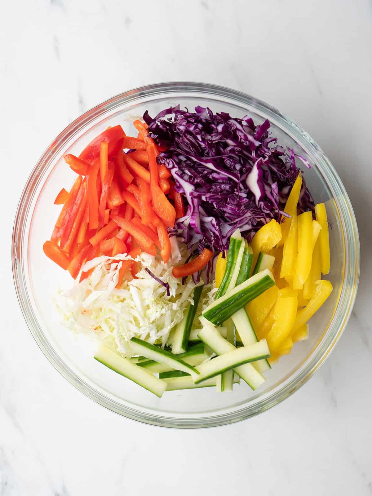 Colorful sliced vegetables in a bowl