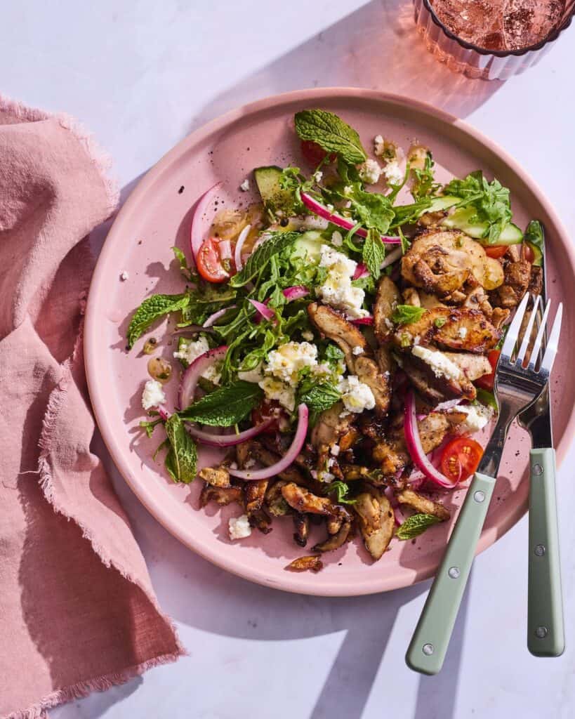 Colorful salad with chicken and herbs