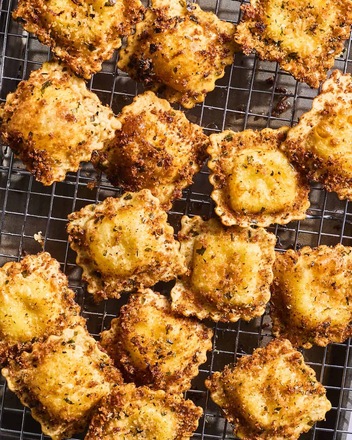 Crispy fried ravioli on cooling rack