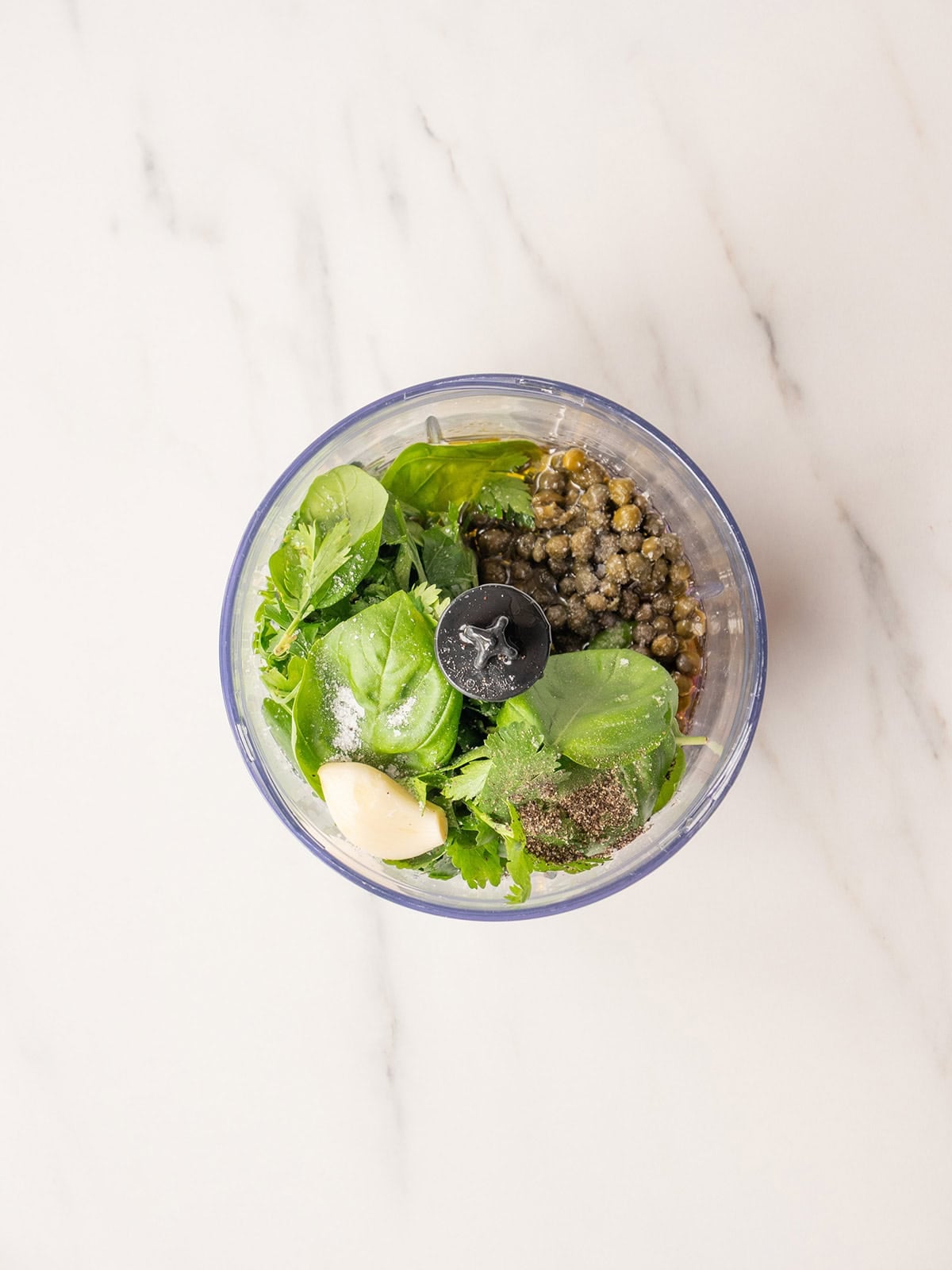 Ingredients in a food processor bowl