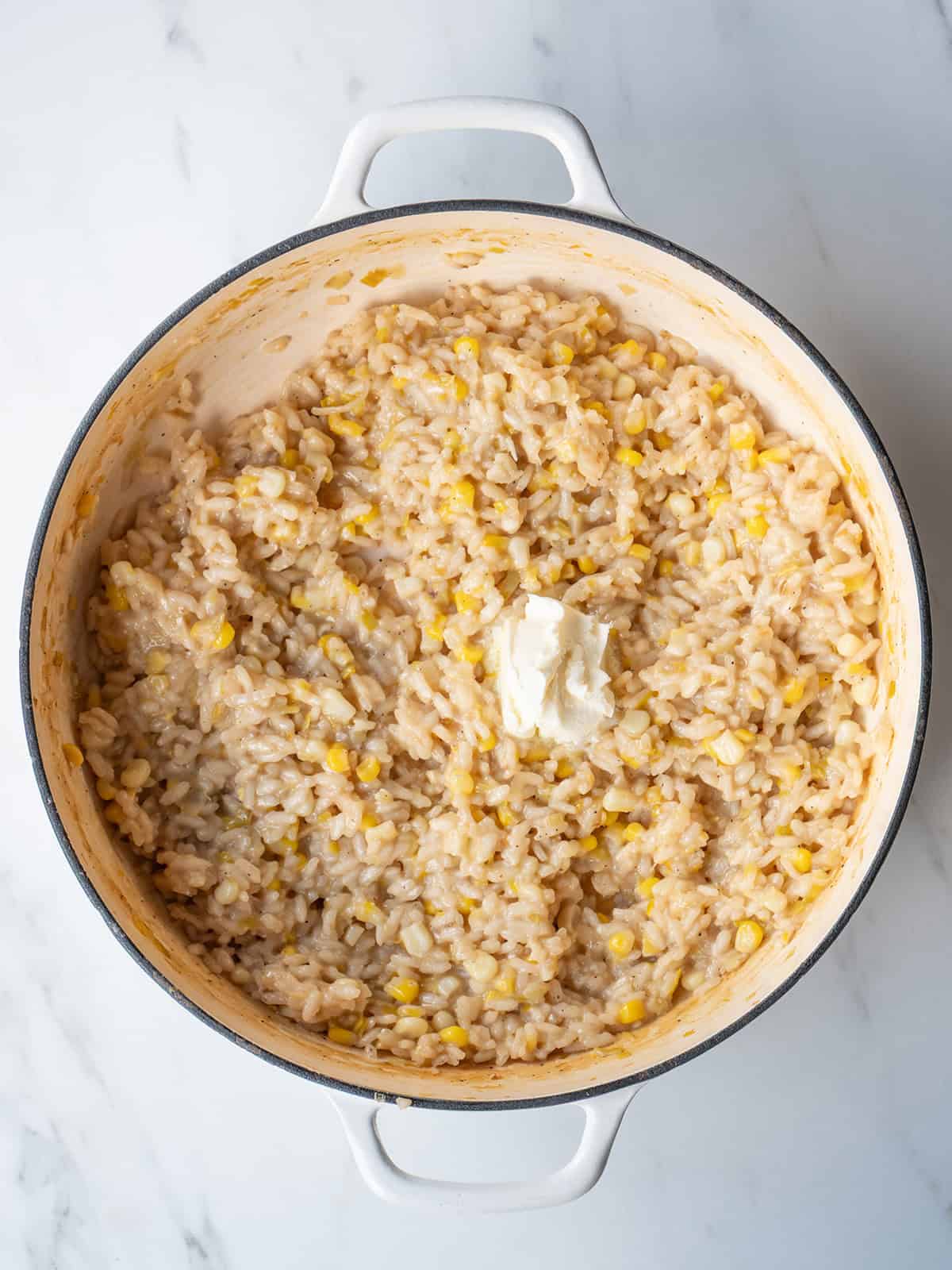 Creamy corn risotto in pot