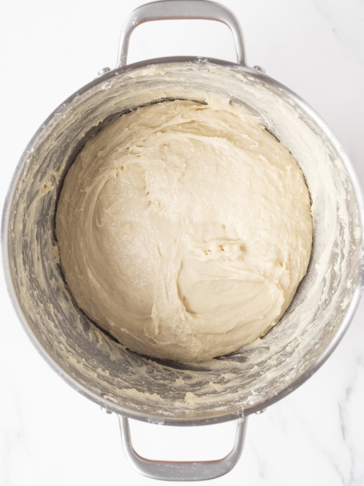 Dough rising in a mixing bowl