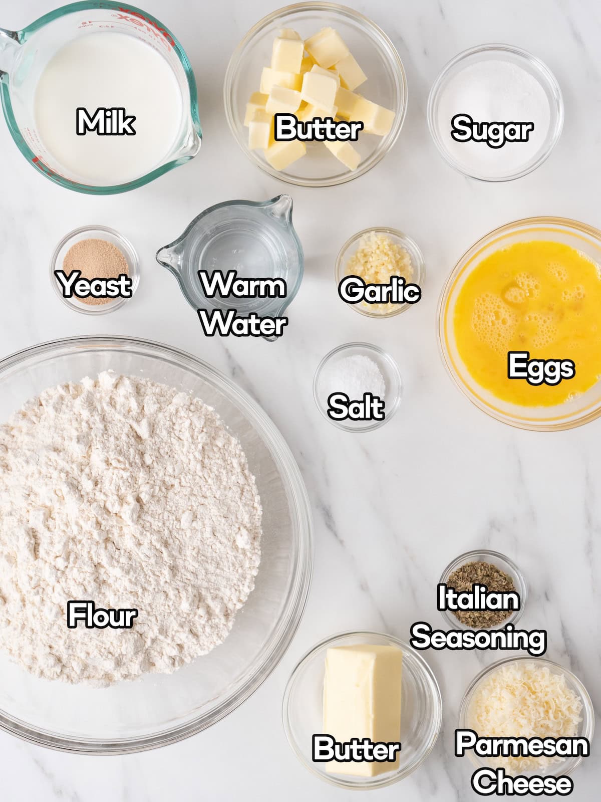 Mise en place of all the ingredients to make garlic herb rolls.