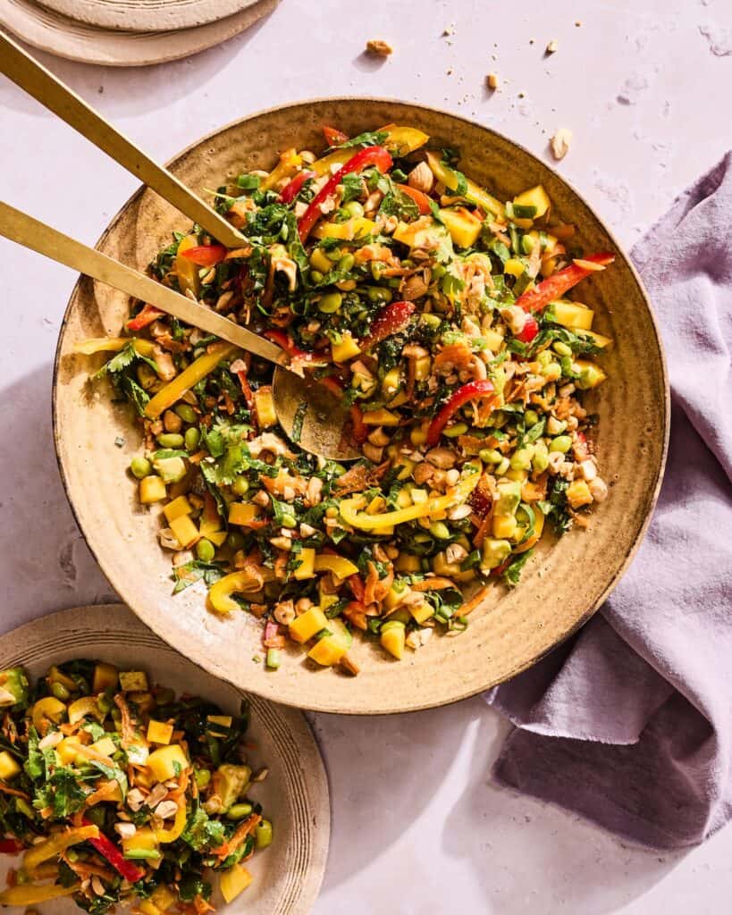 Colorful salad with fresh vegetables and herbs