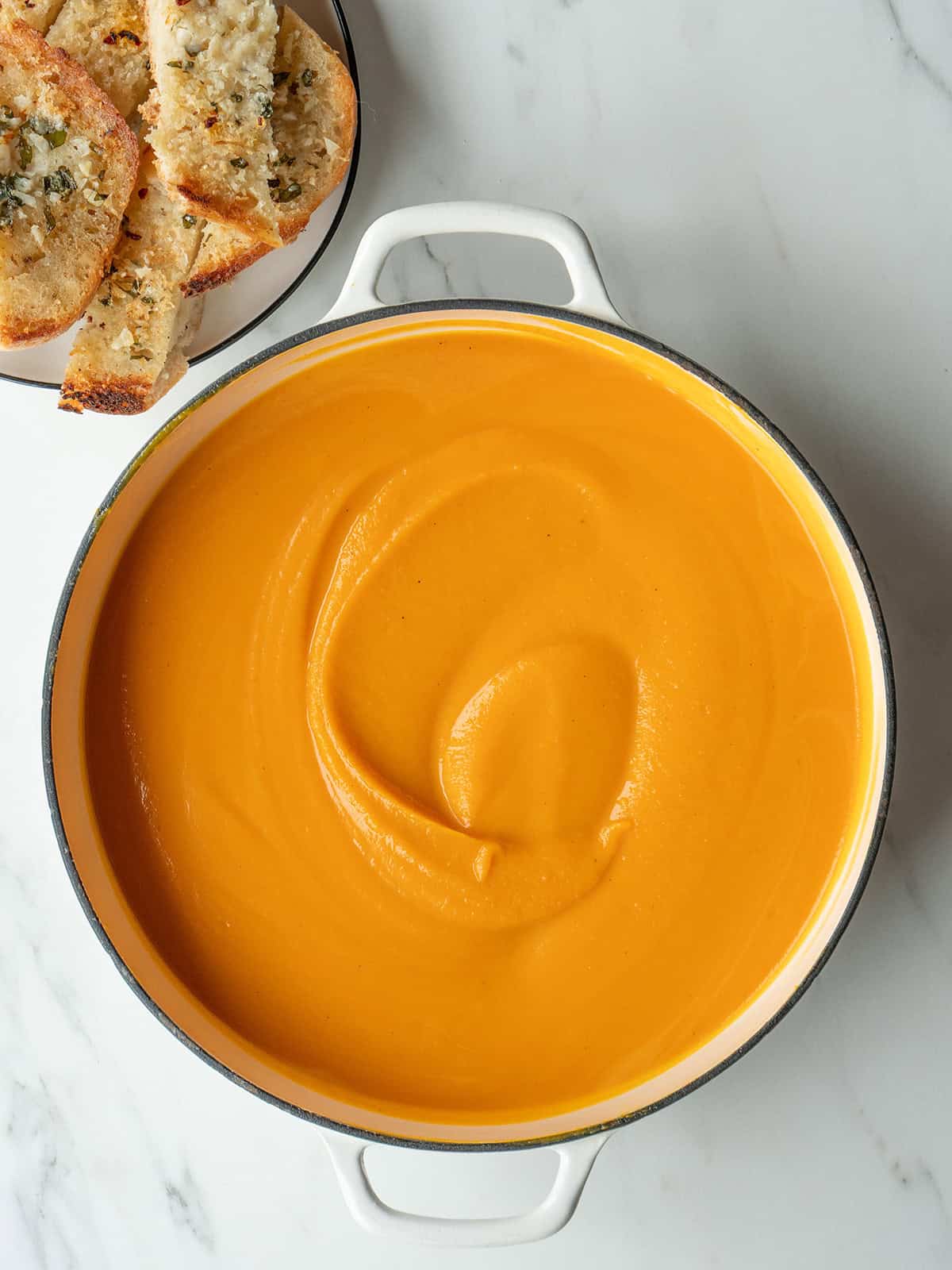 Smooth roasted Butternut Squash Carrot Soup ready to serve
