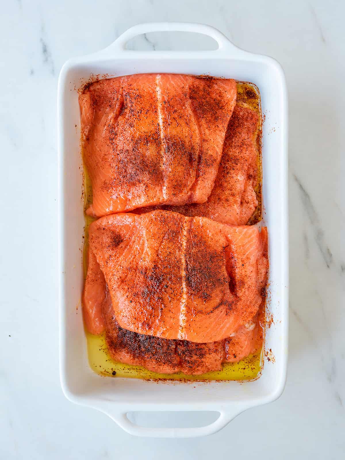 Salmon seasoned with chipotle chile powder for Chipotle Salmon Tacos