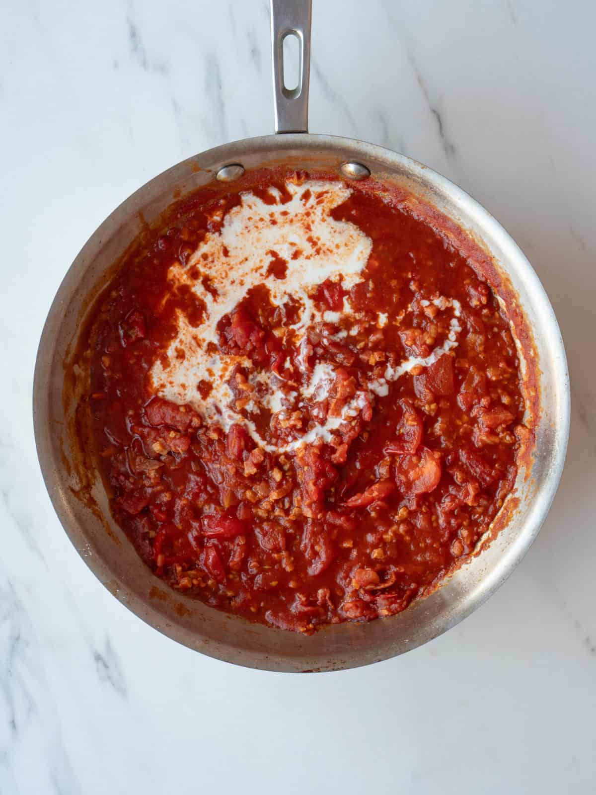 Red sauce in a silver pan