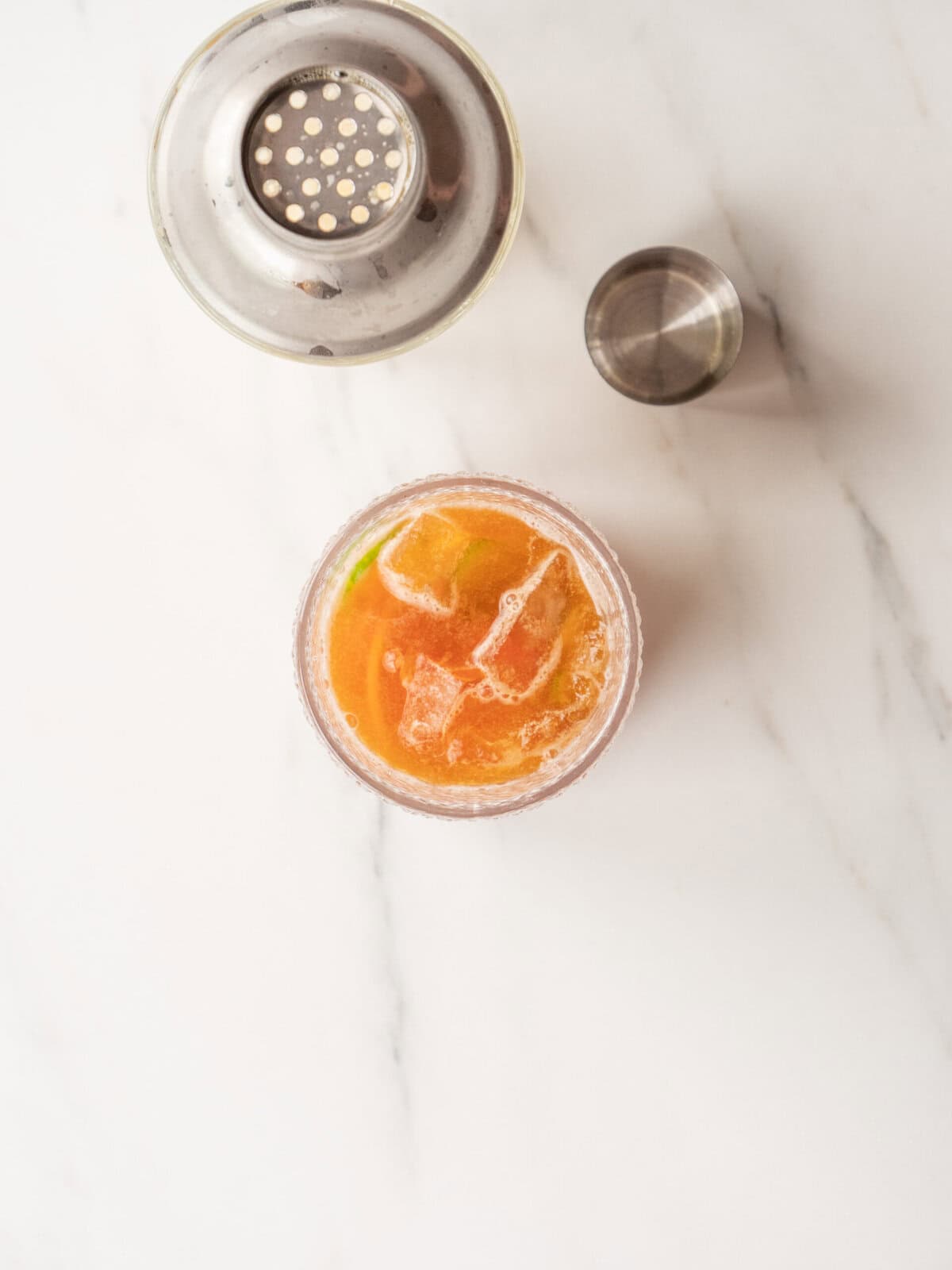 Refreshing drink with ice and garnish