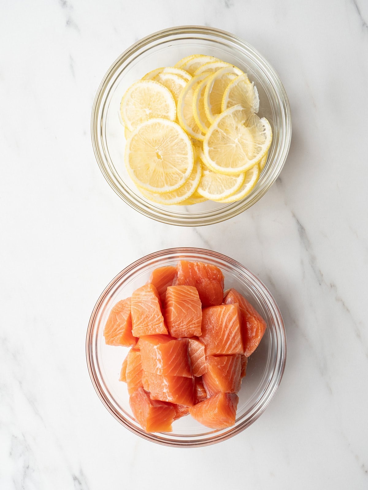 Lemon slices and diced salmon pieces