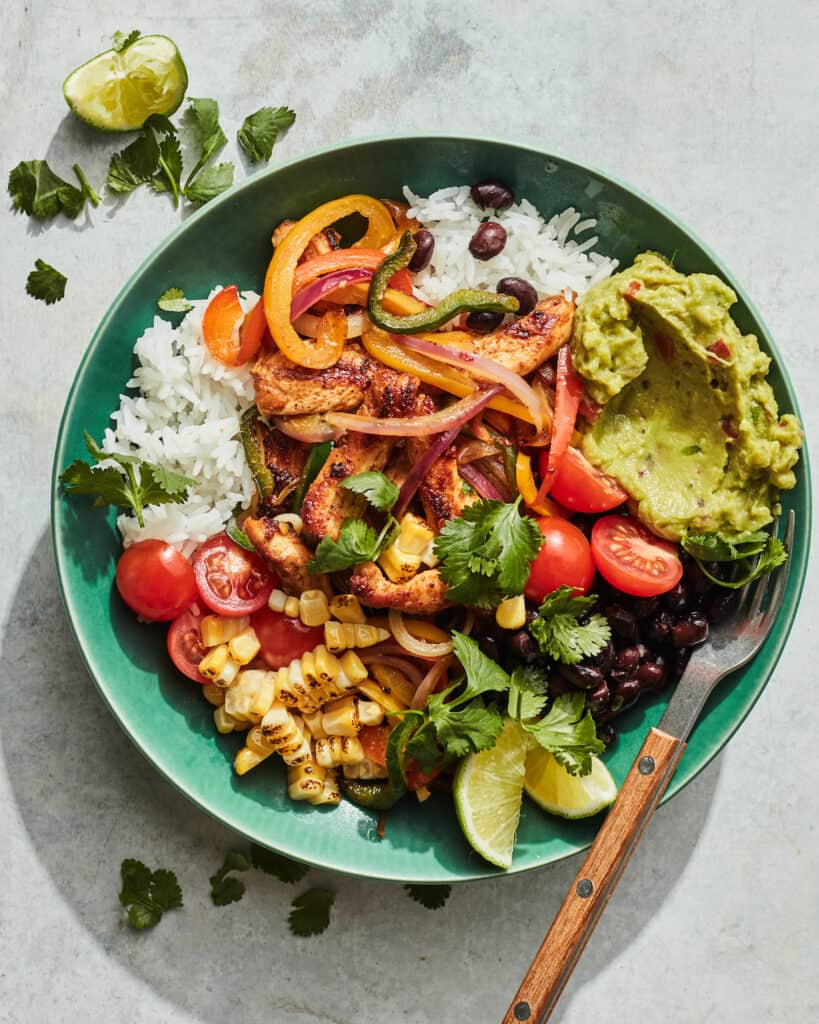 Colorful bowl of chicken fajitas ingredients