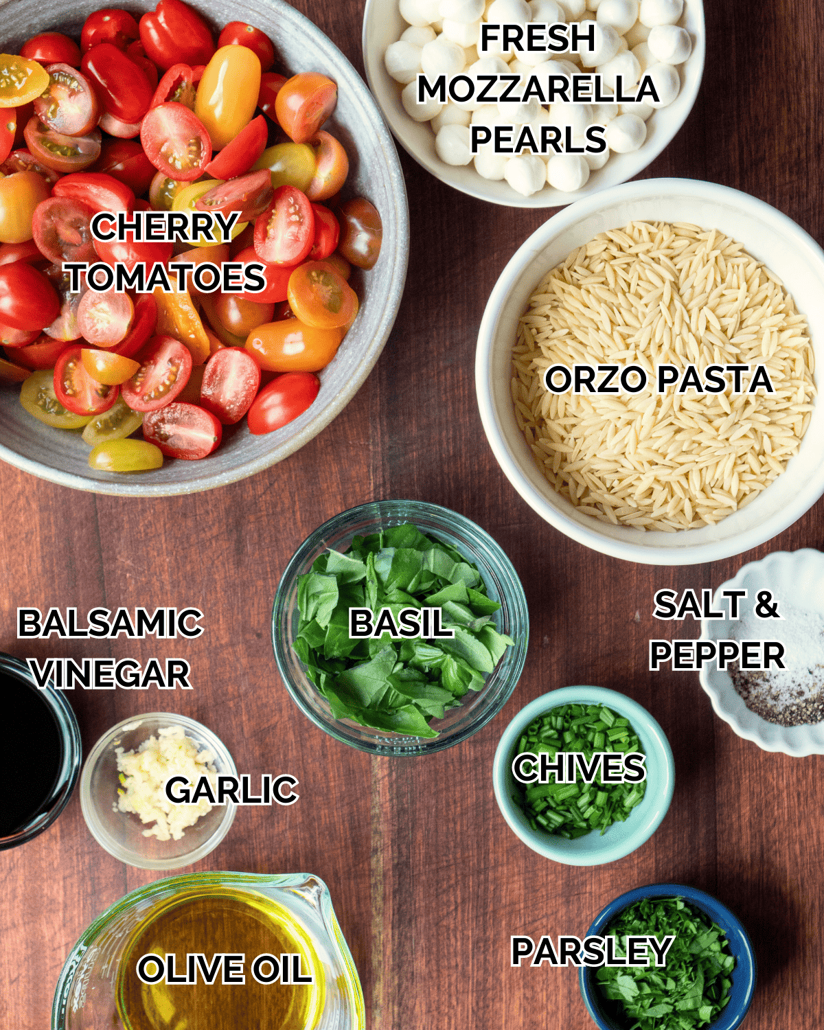 mise-en-place with all the ingredients required to make caprese orzo salad.