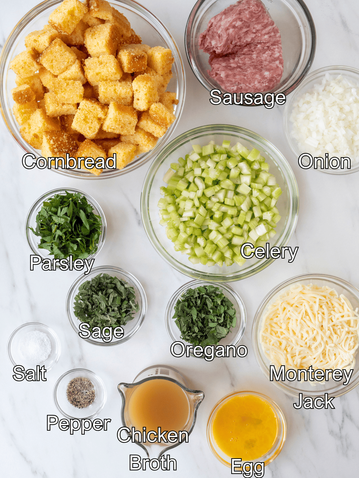 Mise-en-place with all the ingredients required to make cornbread stuffing with sausage.