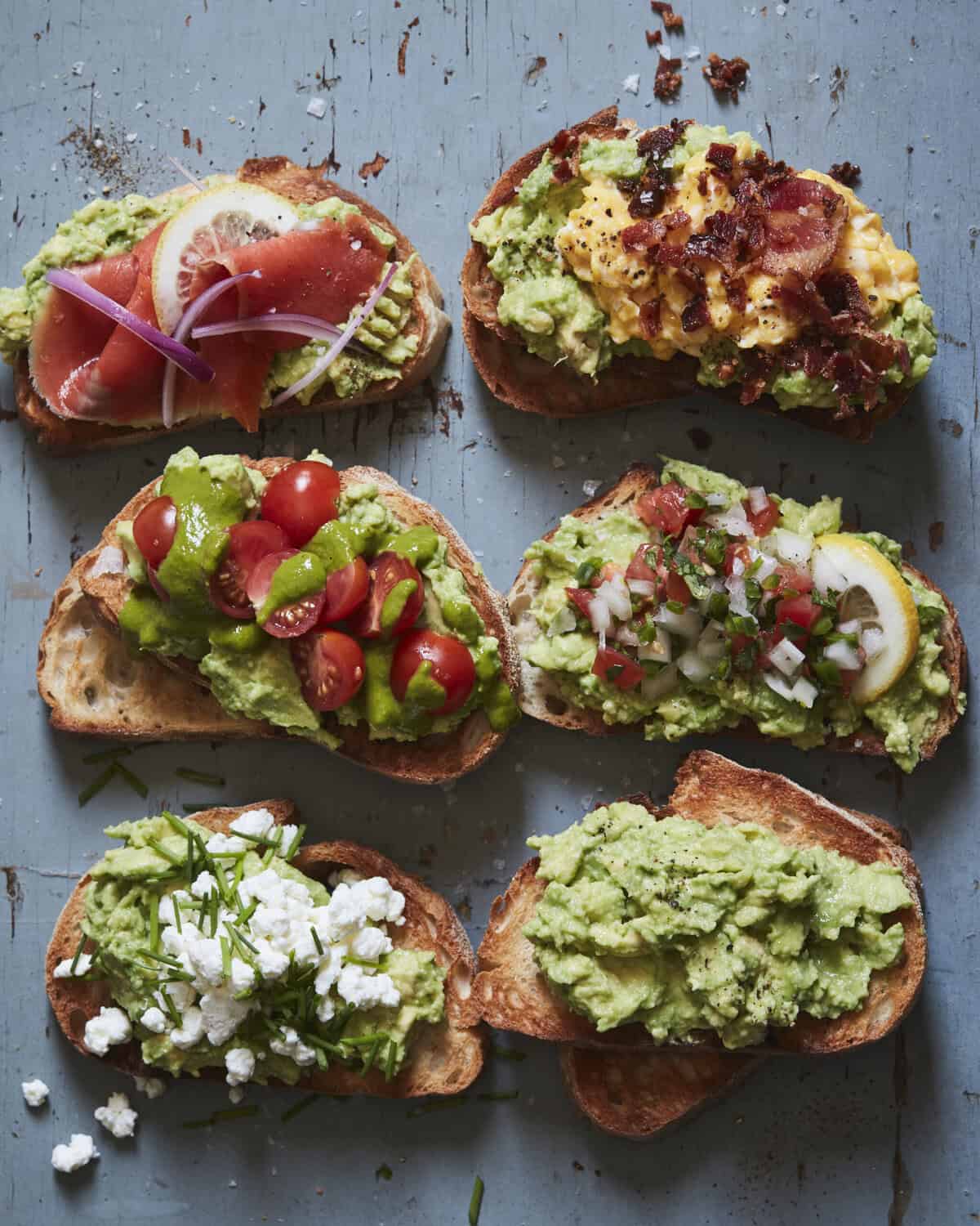 Variety of avocado toast toppings displayed