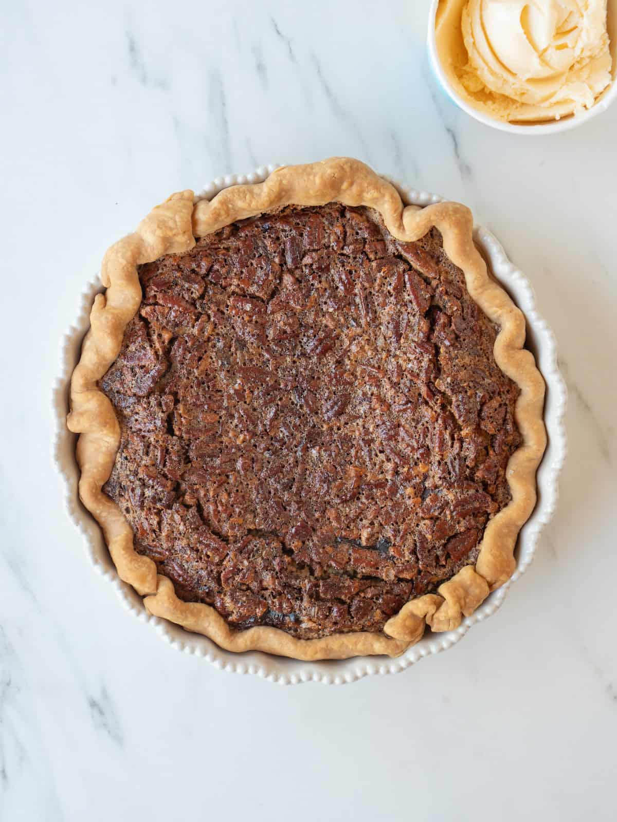 A brown butter bourbon pecan pie just baked in the oven.