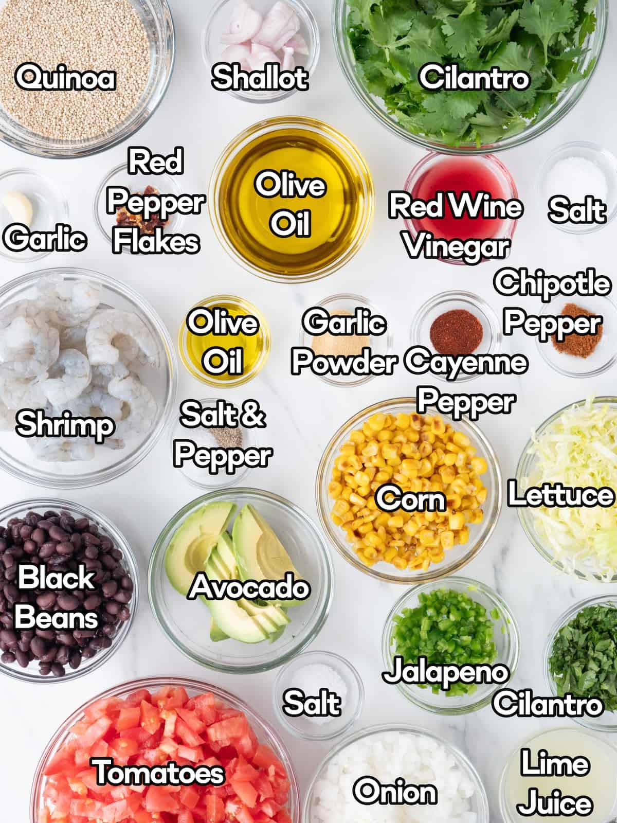 Mise-en-place of all the ingredients to make Avocado Shrimp Quinoa Bowls.