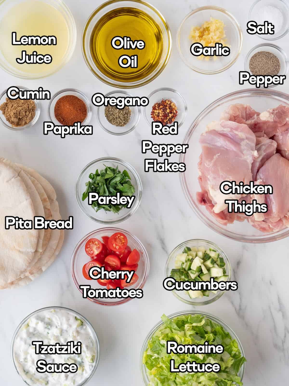 Mise-en-place of all the ingredients to make chicken shawarma stuffed pitas