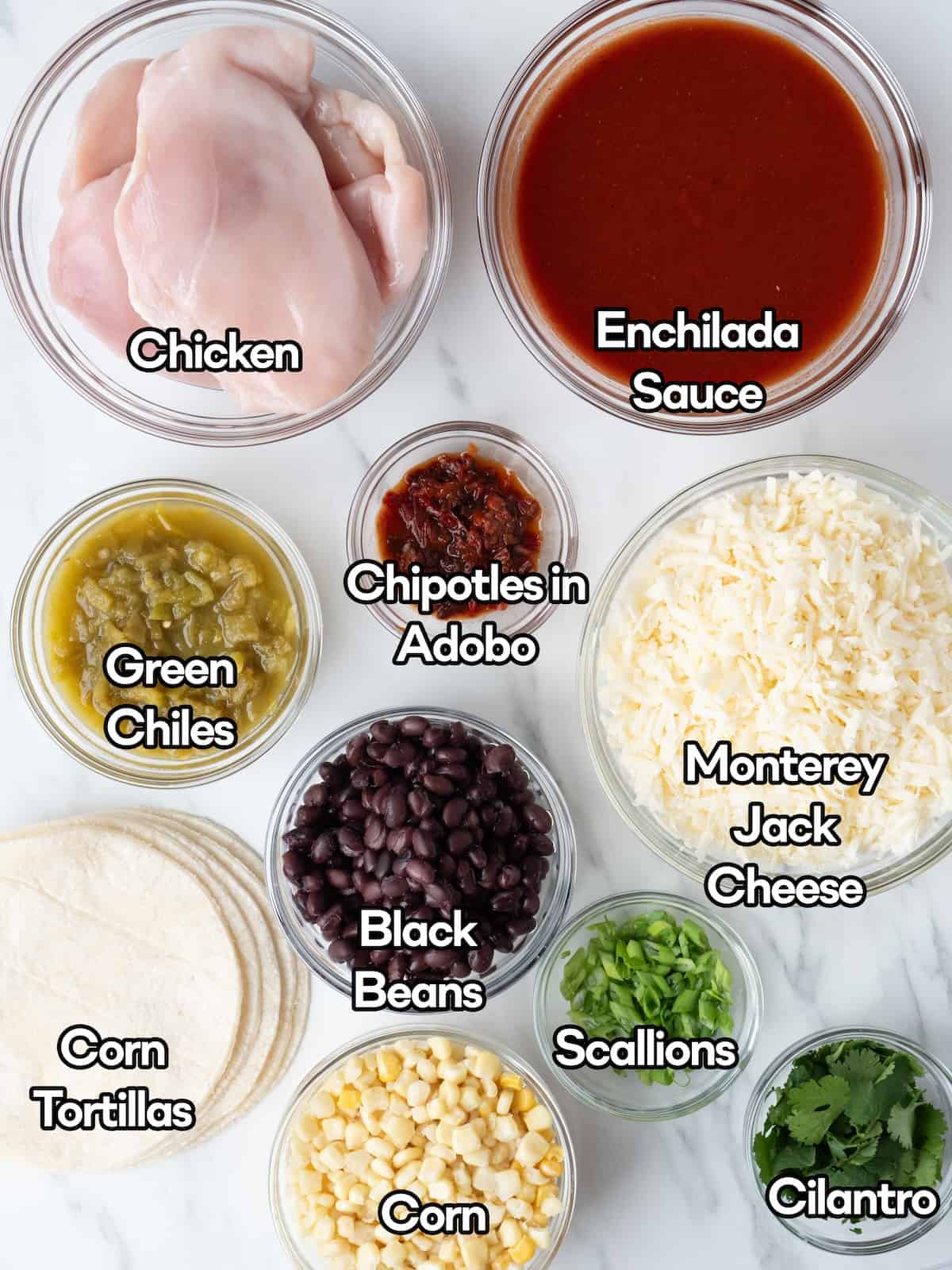 Mise en place of all the ingredients to make skillet chipotle chicken enchilada bake.
