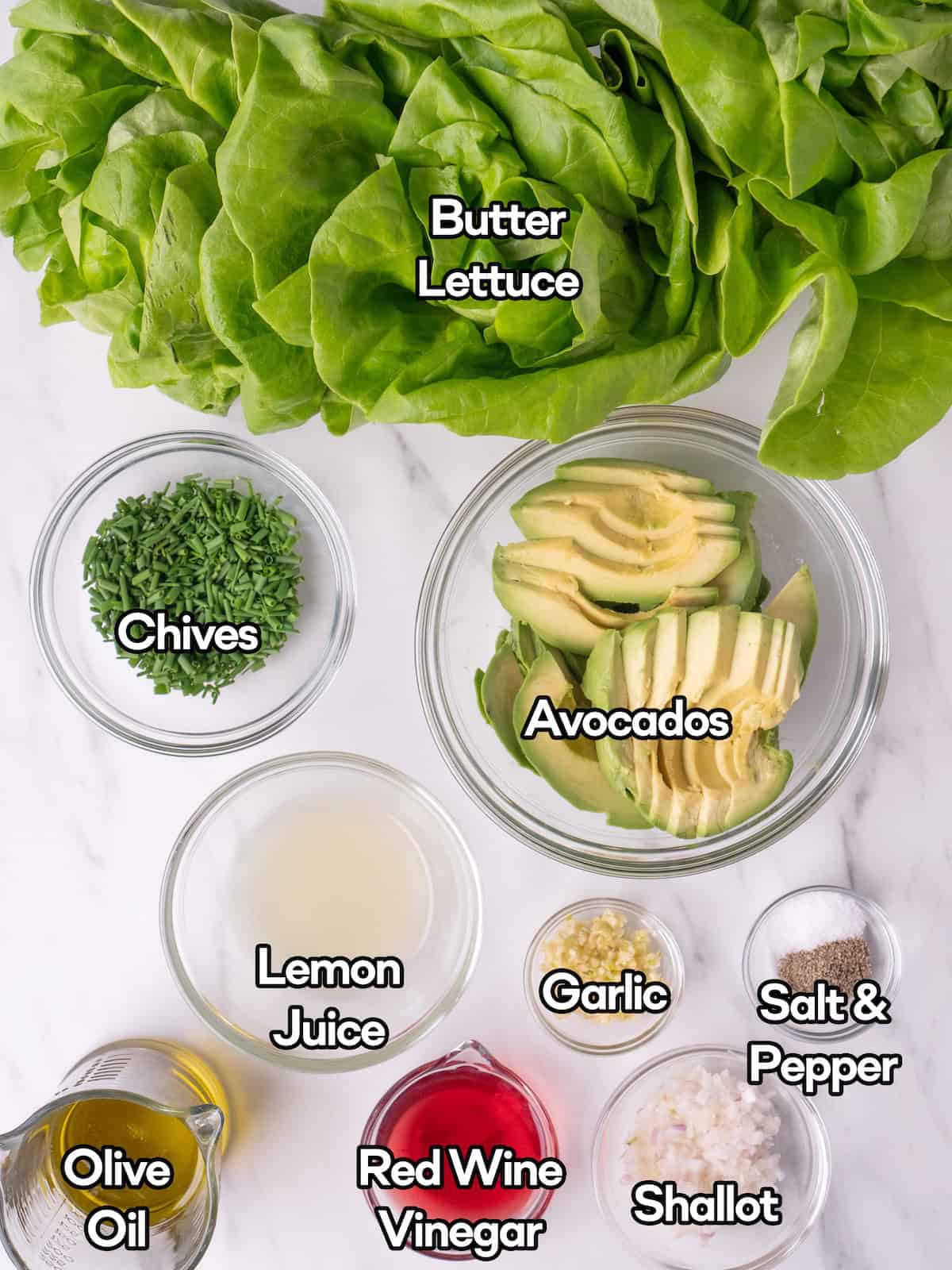 Mise en place of all ingredients to make butter lettuce salad.