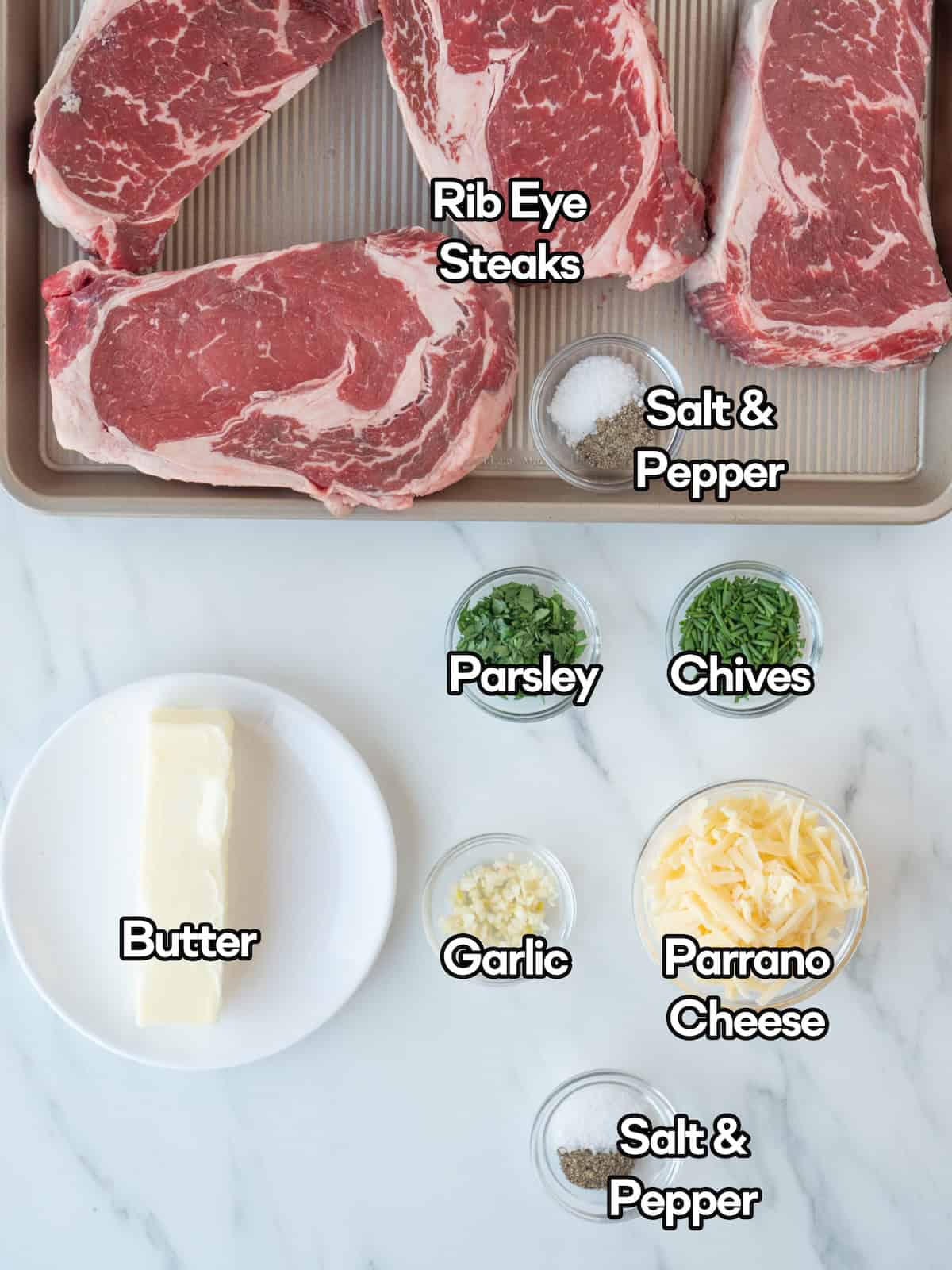 Mise en place of all ingredients to make grilled rib eye steaks with compound butter.