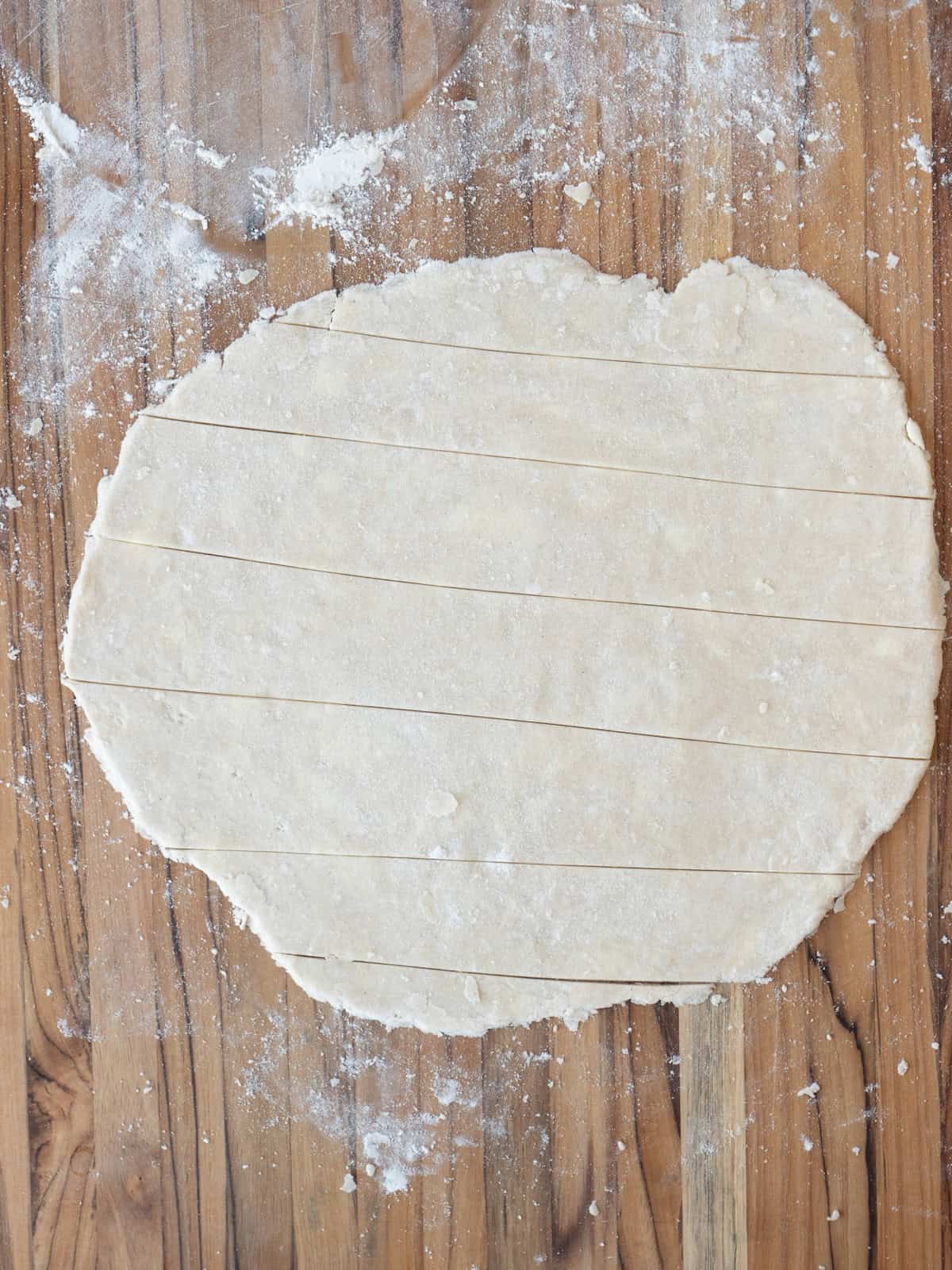 Pie dough rolled out thin and cut into strips about an inch wide.