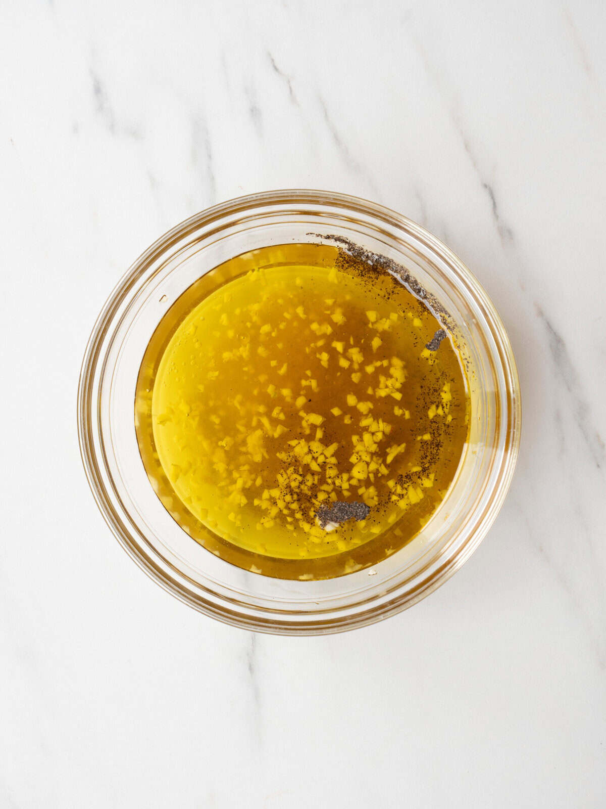 Bowl of oil and garlic mixture