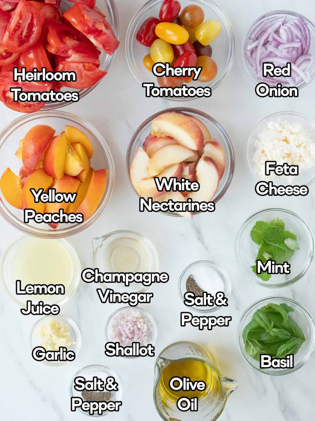 Mise en place of all ingredients to make summer stone fruit salad along with lemon champagne vinaigrette.