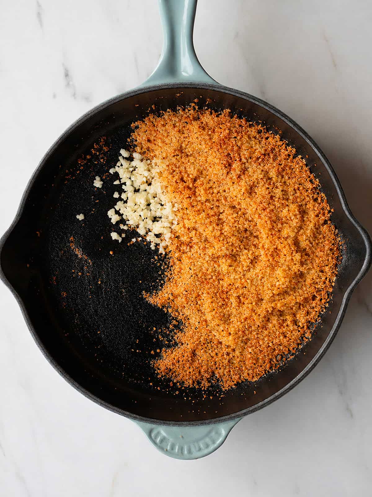 Pan with breadcrumbs and garlic mixture