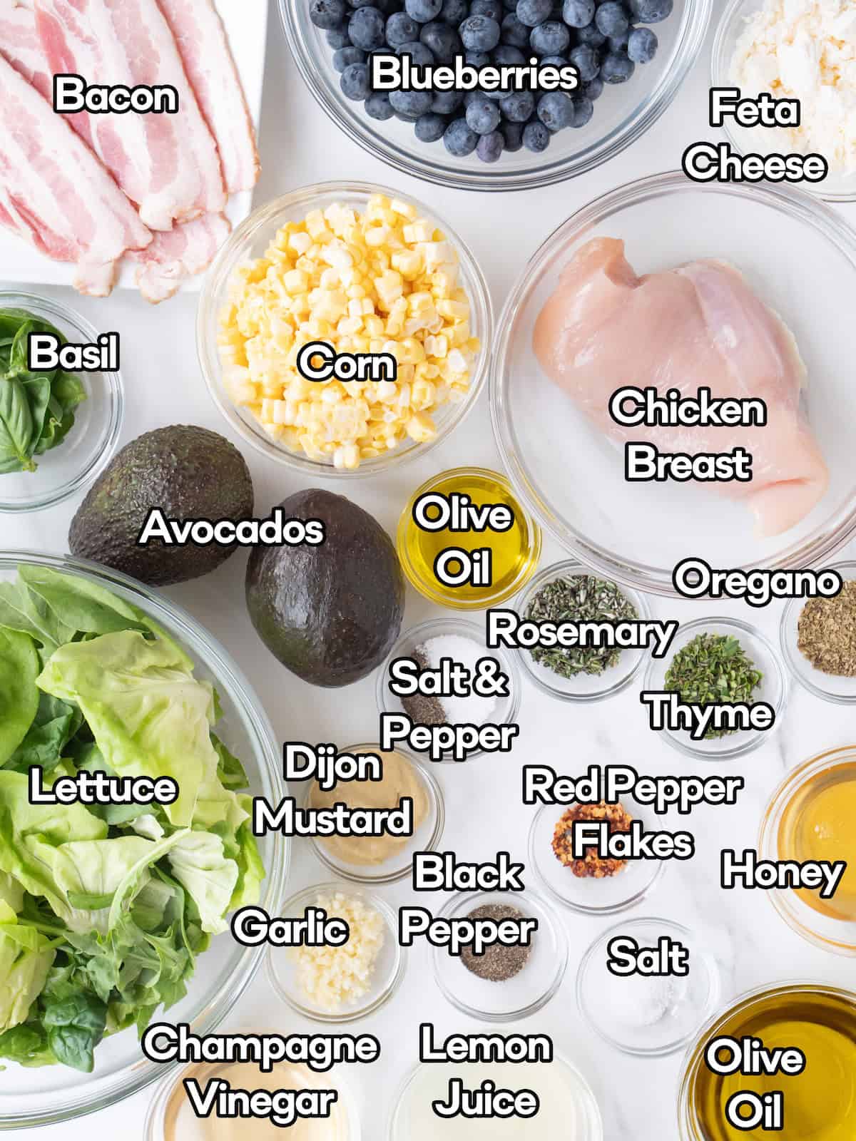 Mise en place of all ingredients to make summer grilled chicken power salad.