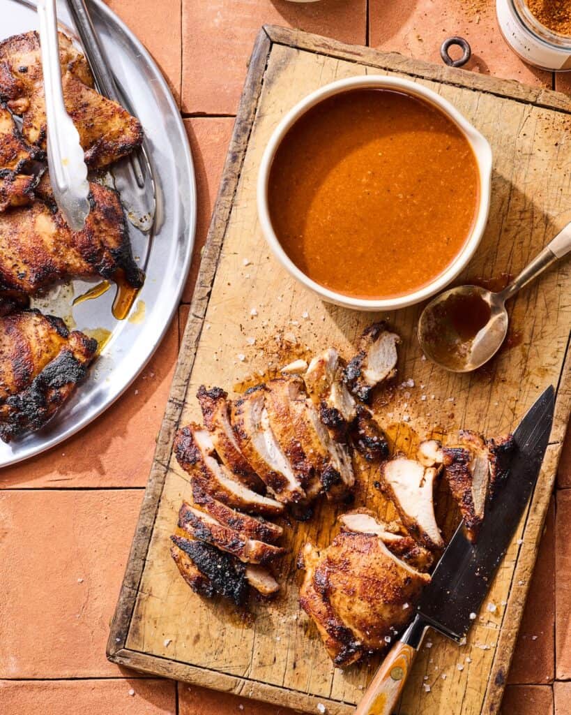 Sliced BBQ chicken with sauce