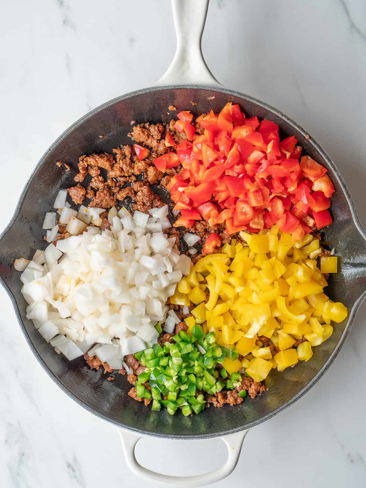 Colorful ingredients in skillet for tacos