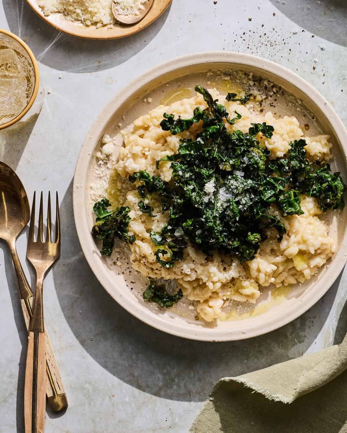 Creamy risotto topped with kale