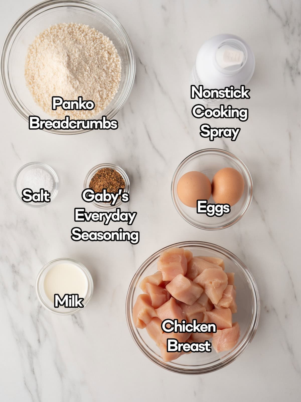 Mise en place of all ingredients to make homemade chicken nuggets.