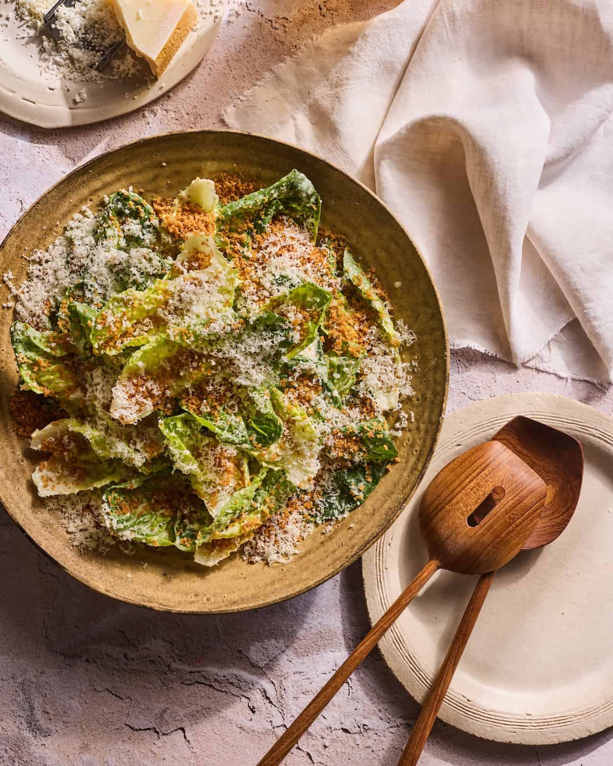 The Perfect Caesar Salad in a big bowl with salad servers