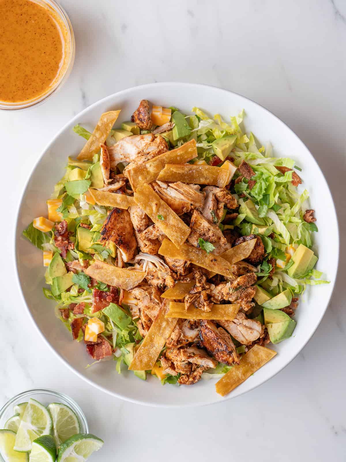 Chicken salad with avocado and tortilla strips