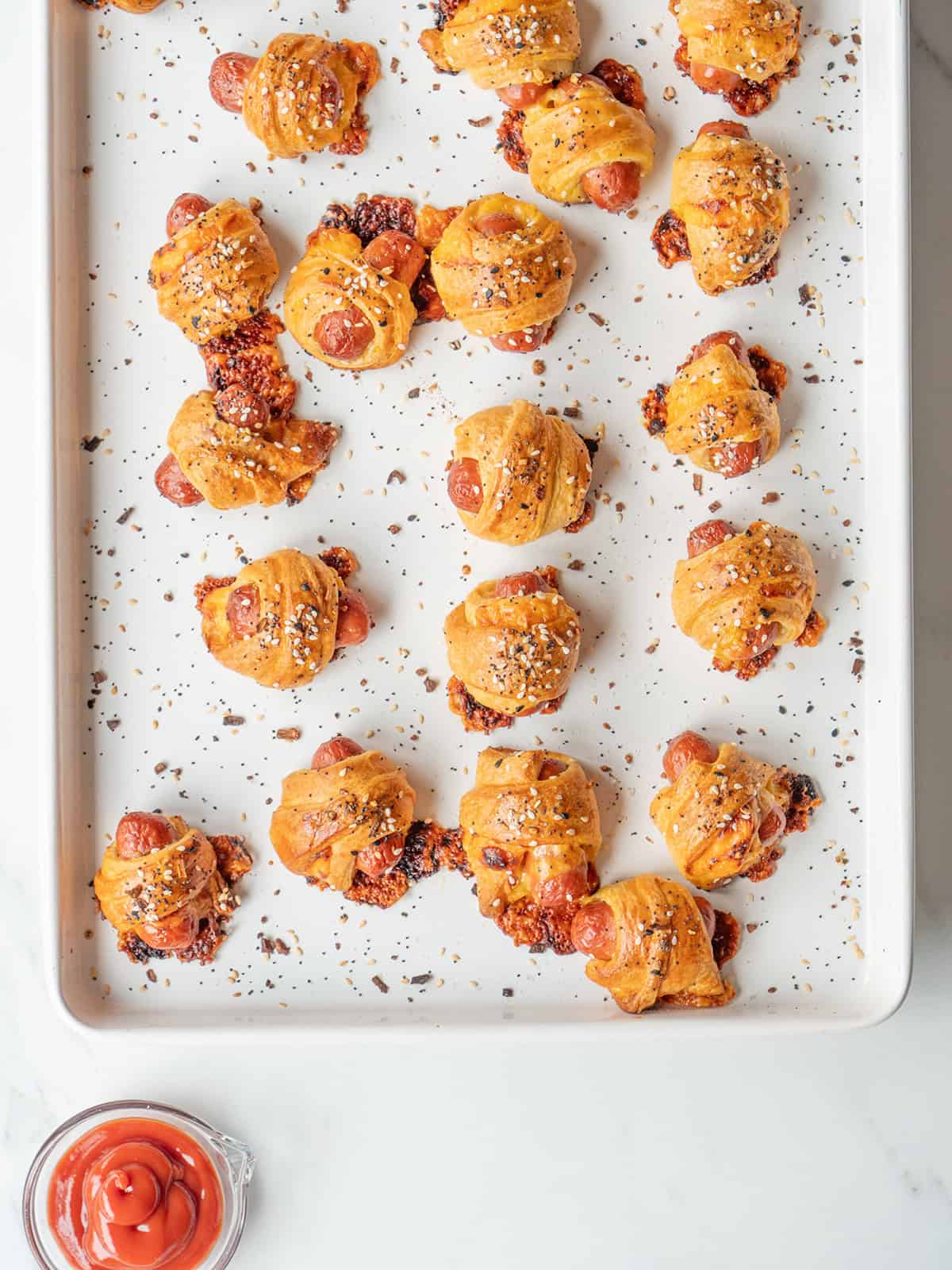 Golden baked Cheddar Wrapped Pigs in a Blanket