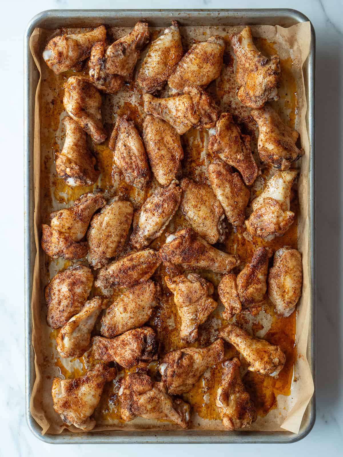 Baked chicken wings on a tray