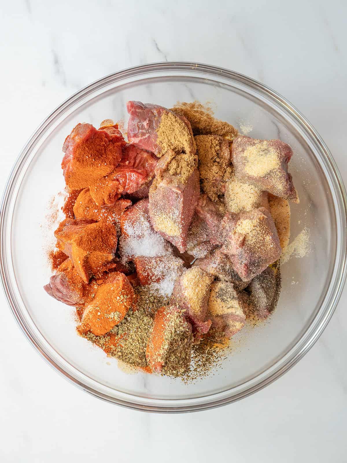 Raw beef with various spices mixed