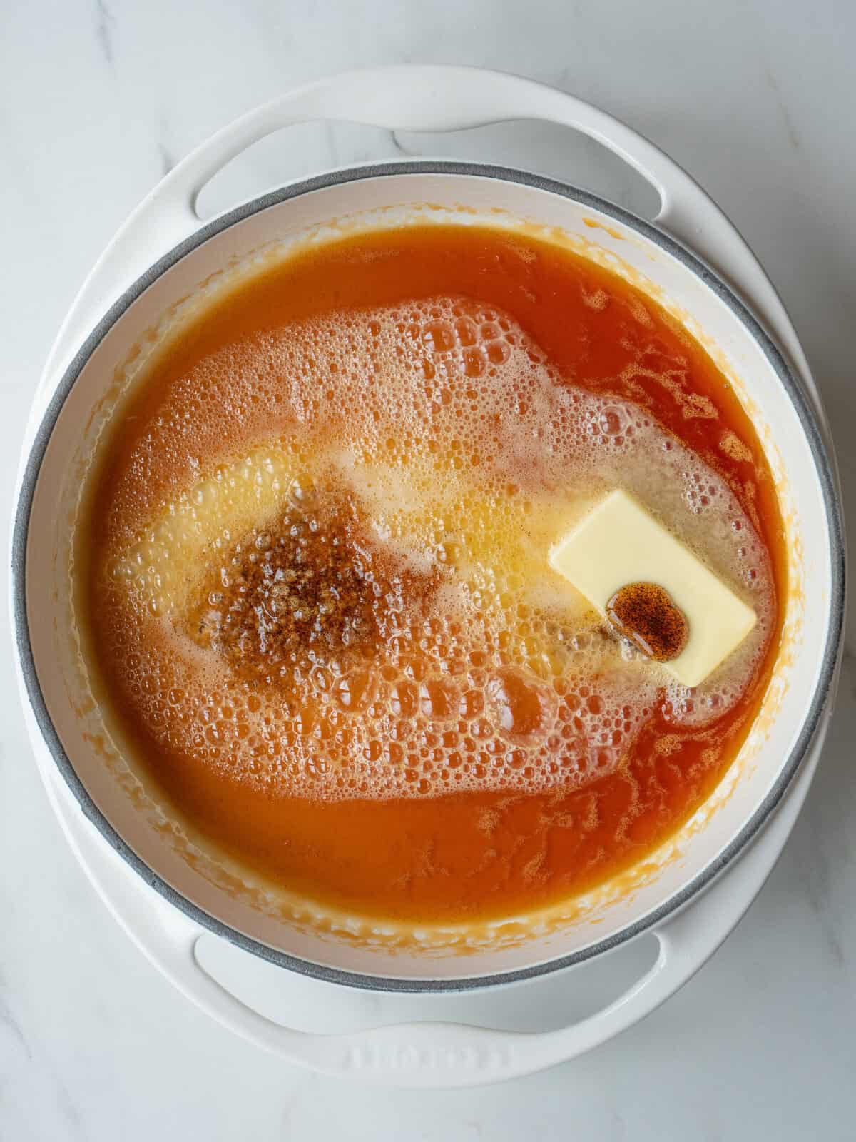 Butter melting in caramelized sugar