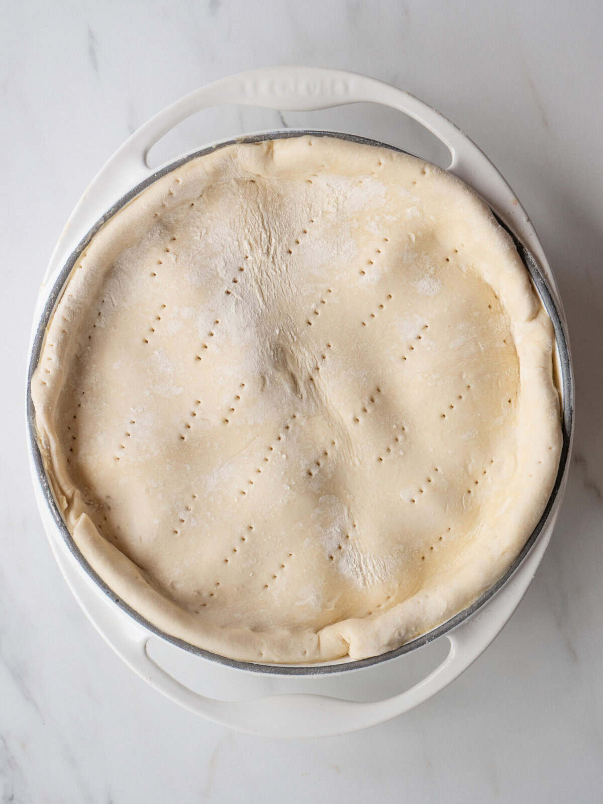 Unbaked puff pastry in a pan