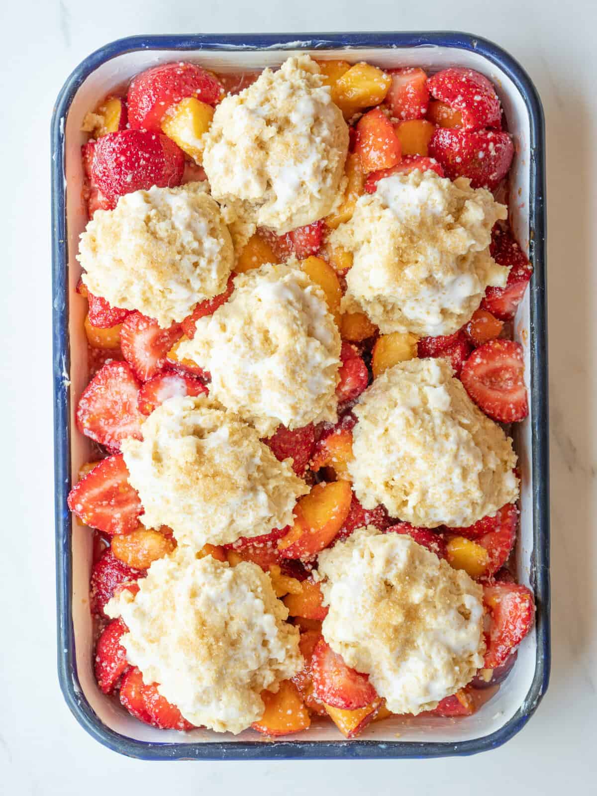 Baked dessert with strawberries and peaches