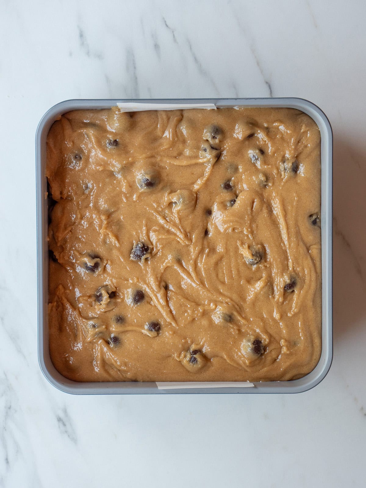 Blondie batter in a pan before baking
