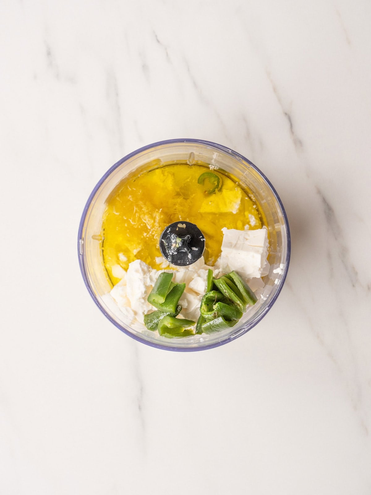 Ingredients in a food processor bowl