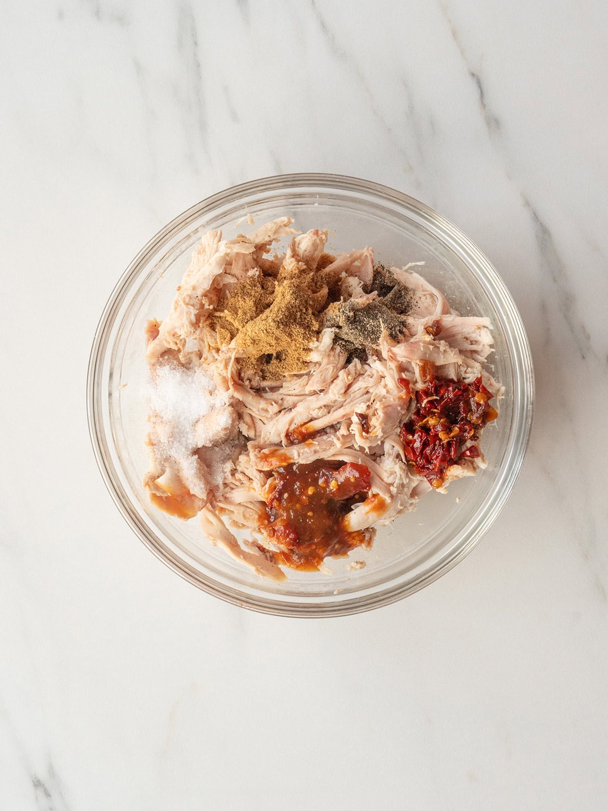 Ingredients for the filling of Homemade Chicken Taquitos in a mixing bowl