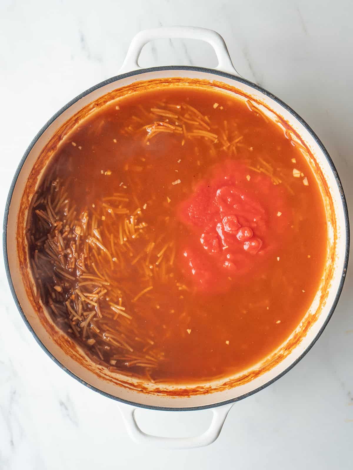 Sopa de Fideo recipe coming together in a large dutch oven