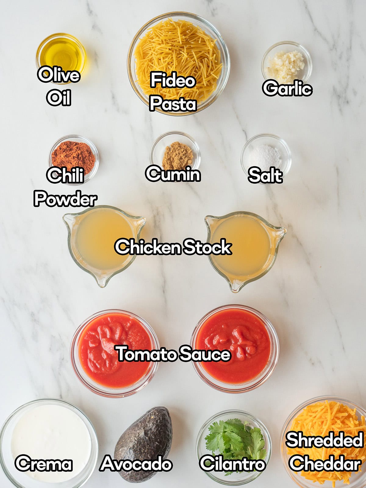 Sopa de Fideo recipe ingredients on a kitchen surface