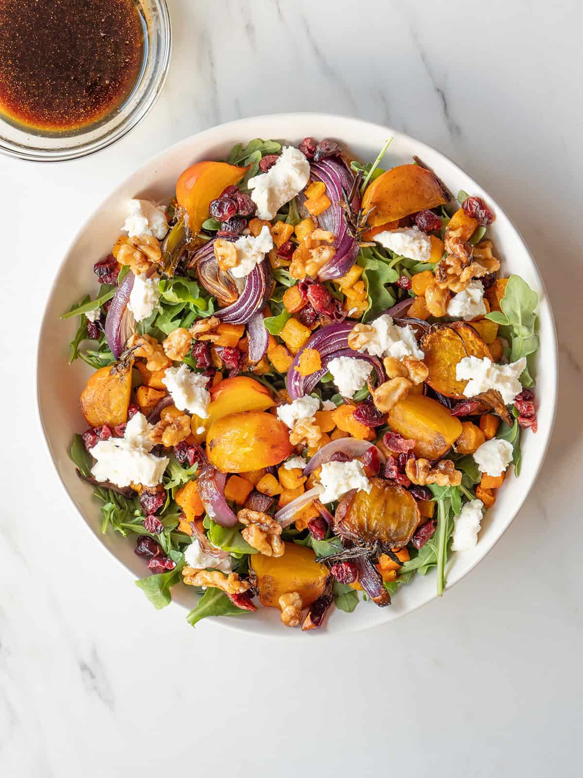 Colorful salad with butternut squash and nuts