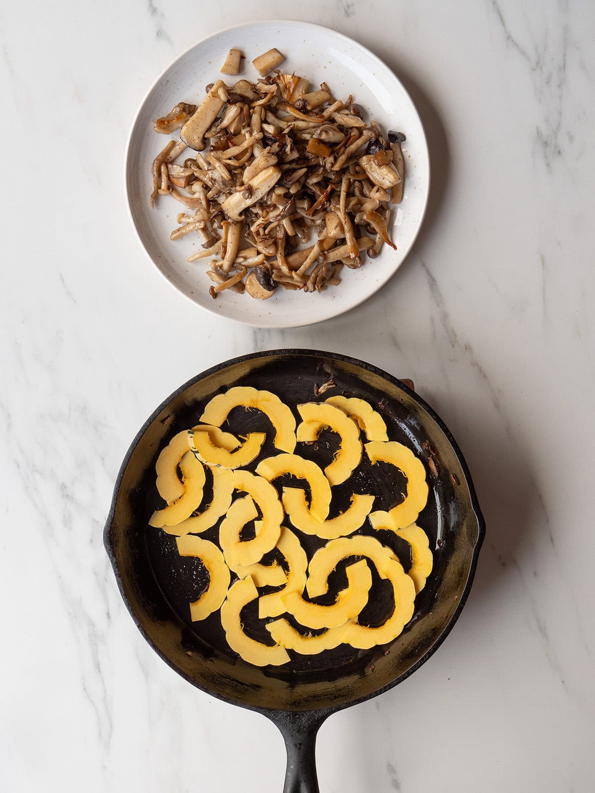 Sliced squash and sautéed mushrooms.