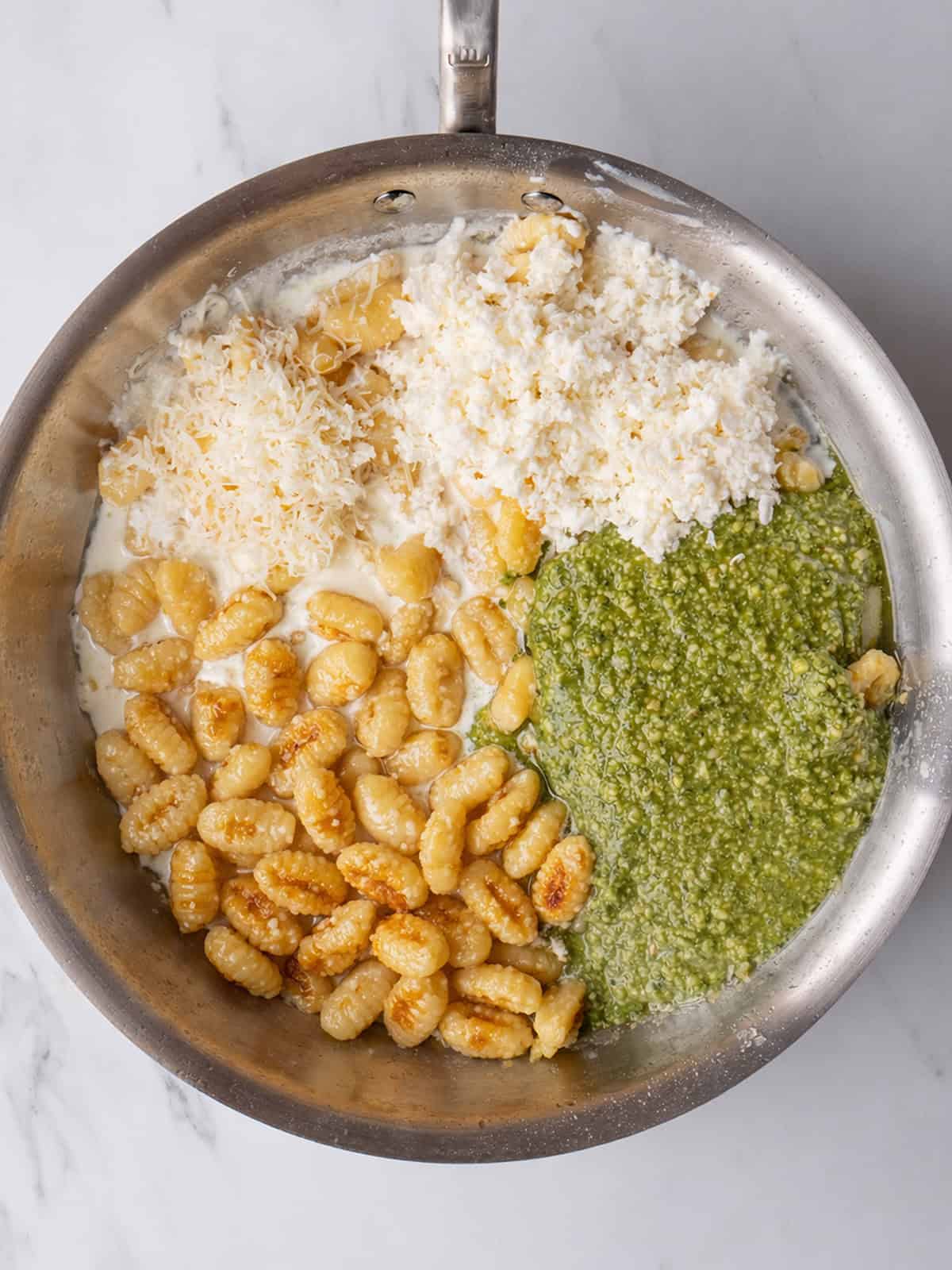 Gnocchi with cheese and pesto sauce